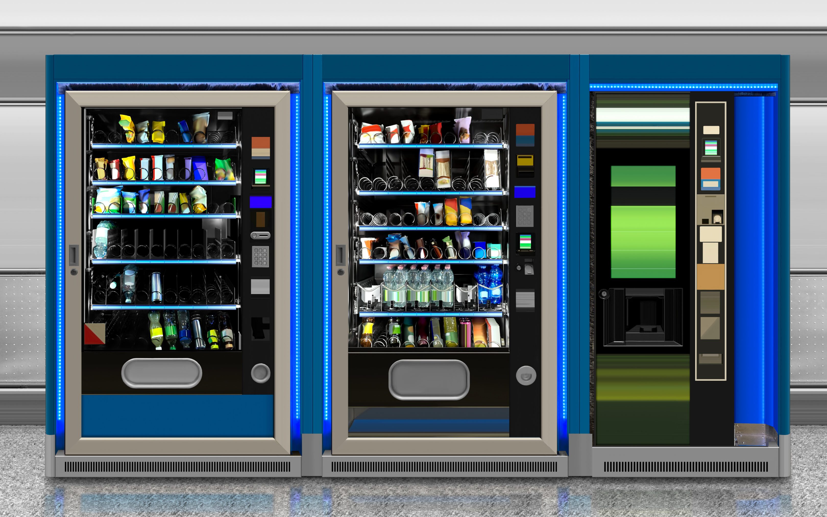 Two vending machines stocked with snacks and drinks, and one empty machine.